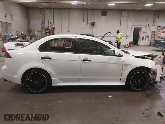 2014 Mitsubishi Lancer GT with VIN JA32U8FWXEU016230, listed as a IAAI auction lot 41379899 with 108,511 mi miles. Bid and sale history available at carsss.com. Image 13.