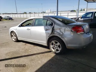 2009 Saturn Aura XE with VIN 1G8ZS57B99F182341, listed as a Copart auction lot 51258495 with 117,670 mi miles and Salvage Title. Bid and sale history available at DreamBid. Image 2.