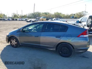 2012 Honda Insight LX with VIN JHMZE2H51CS003694, listed as a IAAI auction lot 41781384 with 154,685 mi miles and . Bid and sale history available at DreamBid. Image 14.