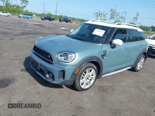 2022 MINI Countryman Cooper S with VIN WMZ53BR02N3N67991, listed as a IAAI auction lot 42181491 with 54,701 mi miles and . Bid and sale history available at DreamBid. Image 2.