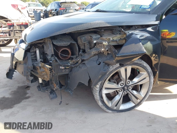 2013 Hyundai Veloster w/Black Int with VIN KMHTC6AD2DU171044, listed as a IAAI auction lot 42245907 with 140,542 mi miles and . Bid and sale history available at DreamBid. Image 6.