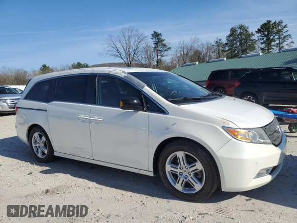 2012 Honda Odyssey Touring with VIN 5FNRL5H96CB144690, listed as a Copart auction lot 54192925 with 44,030 mi miles and Clean Title. Bid and sale history available at carsss.com. Image 4.