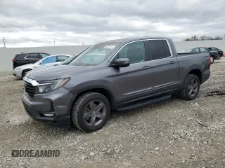 2021 Honda Ridgeline RTL z VIN 5FPYK3F5XMB027531, wystawiony jako Copart lot #80272974 z przebiegiem 30 435 mil mil oraz Szkoda całkowita • Salvage title. Historia ofert i sprzedaży dostępna na DreamBid. Obrazek 1.