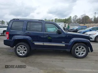 2012 Jeep Liberty Sport with VIN 1C4PJMAK2CW210975, listed as a IAAI auction lot 41904478 with 136,462 mi miles. Bid and sale history available at carsss.com. Image 14.