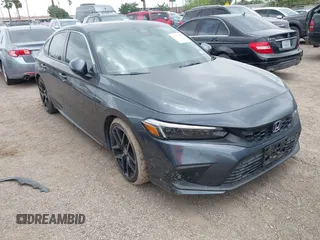 2022 Honda Civic Sport Touring z VIN 19XFL1H84NE010790, wystawiony jako IAAI lot #42079632 z przebiegiem 27 256 mil mil oraz . Historia ofert i sprzedaży dostępna na DreamBid. Obrazek 1.