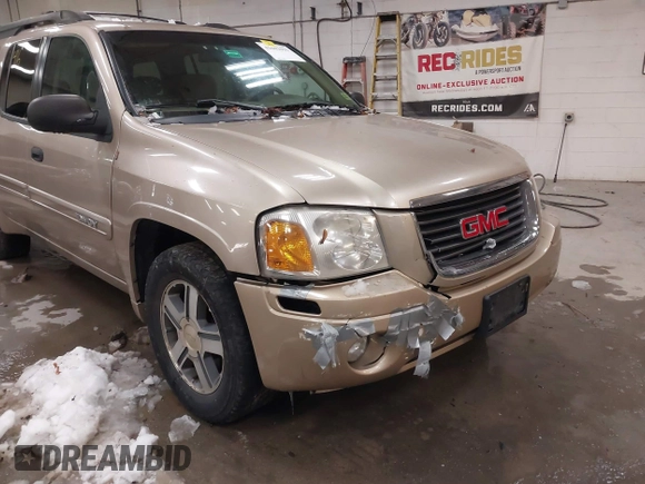 2004 GMC Envoy SLT with VIN 1GKET16S746148679, listed as a IAAI auction lot 41602991 with 196,621 mi miles and . Bid and sale history available at DreamBid. Image 6.