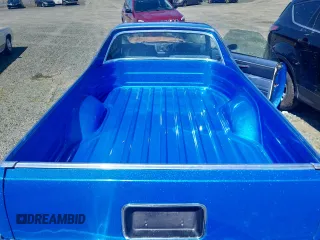1981 Chevrolet El Camino z VIN 1GCCW80HXBZ404115, wystawiony jako Copart lot #58426095 z przebiegiem Nie podano mil oraz Szkoda całkowita • Salvage title. Historia ofert i sprzedaży dostępna na DreamBid. Obrazek 10.