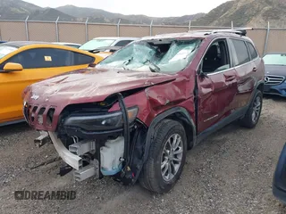 2019 Jeep Cherokee Latitude Plus with VIN 1C4PJMLX8KD330606, listed as a IAAI auction lot 41733246 with 94,408 mi miles. Bid and sale history available at carsss.com. Image 2.