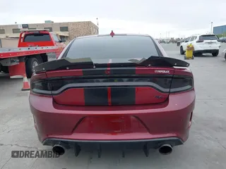 2019 Dodge Charger R/T with VIN 2C3CDXCT2KH749207, listed as a IAAI auction lot 42120658 with 52,330 mi miles and . Bid and sale history available at carsss.com. Image 16.