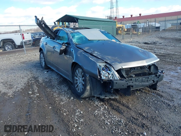 2012 Cadillac CTS Luxury z VIN 1G6DG5E53C0129159, wystawiony jako IAAI lot #41476575 z przebiegiem 97 676 mil mil oraz . Historia ofert i sprzedaży dostępna na DreamBid. Obrazek 1.