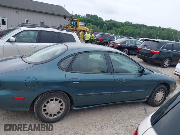 1996 Ford Taurus LX with VIN 1FALP53S3TG177324, listed as a IAAI auction lot 42622520 with 126,979 mi miles and . Bid and sale history available at DreamBid. Image 13.