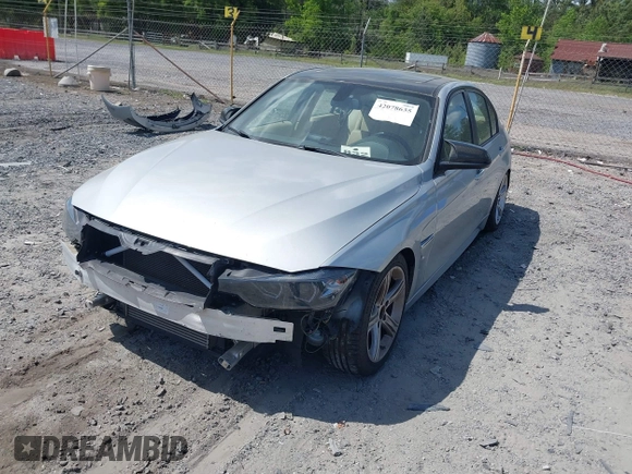 2013 BMW 3 Series 328i with VIN WBA3A5C57DF356069, listed as a IAAI auction lot 42078635 with 140,669 mi miles. Bid and sale history available at carsss.com. Image 2.