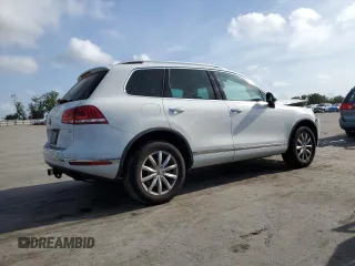 2017 Volkswagen Touareg Sport with VIN WVGEF7BP0HD006792, listed as a Copart auction lot 47895813 with 52,432 mi miles and . Bid and sale history available at DreamBid. Image 3.