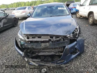 2017 Mazda 3 Touring with VIN 3MZBN1V77HM123452, listed as a Copart auction lot 57786485 with 117,811 mi miles and Salvage title. Bid and sale history available at DreamBid. Image 5.