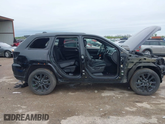 2018 Jeep Grand Cherokee Laredo E with VIN 1C4RJFAG5JC280033, listed as a IAAI auction lot 41953744 with 69,269 mi miles and . Bid and sale history available at DreamBid. Image 6.