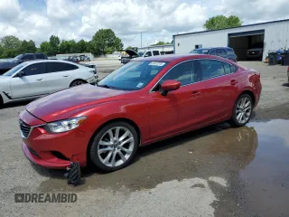 2014 Mazda 6 i Touring with VIN JM1GJ1V6XE1123532, listed as a Copart auction lot 61027275 with 177,065 mi miles and Salvage title. Bid and sale history available at DreamBid. Image 1.