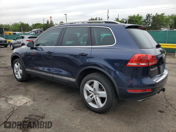2011 Volkswagen Touareg Lux z VIN WVGFK9BP4BD001551, wystawiony jako Copart lot #58743065 z przebiegiem 142 661 mil mil oraz Szkoda całkowita • Salvage title. Historia ofert i sprzedaży dostępna na DreamBid. Obrazek 2.