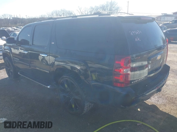 2011 Chevrolet Suburban LT with VIN 1GNSCJE06BR293634, listed as a IAAI auction lot 41742616 with 204,222 mi miles. Bid and sale history available at carsss.com. Image 3.
