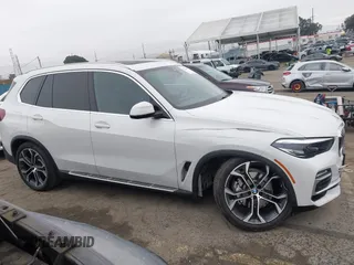 2021 BMW X5 sDrive40i with VIN 5UXCR4C0XM9F73416, listed as a IAAI auction lot 41722856 with 25,115 mi miles. Bid and sale history available at carsss.com. Image 13.