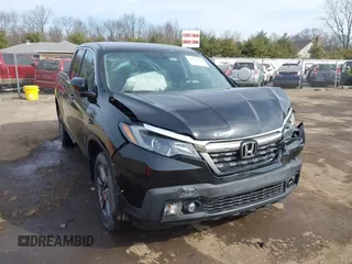2017 Honda Ridgeline RTL z VIN 5FPYK3F59HB014002, wystawiony jako IAAI lot #41781159 z przebiegiem 110 393 mil mil oraz . Historia ofert i sprzedaży dostępna na DreamBid. Obrazek 1.