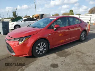 2021 Toyota Corolla Hybrid LE with VIN JTDEAMDE5MJ012662, listed as a Copart auction lot 52142455 with 138,564 mi miles and Clean Title. Bid and sale history available at carsss.com. Image 1.