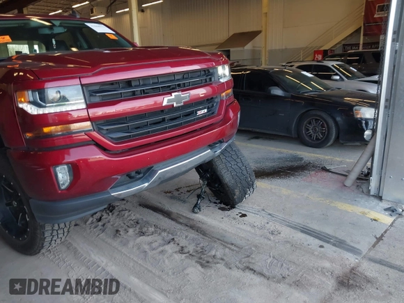 2018 Chevrolet Silverado 1500 LT with VIN 3GCUKREC0JG580317, listed as a IAAI auction lot 41868522 with 75,738 mi miles. Bid and sale history available at carsss.com. Image 18.