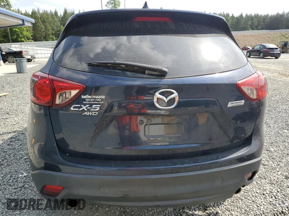 2016 Mazda CX-5 Sport z VIN JM3KE4BY8G0837052, wystawiony jako Copart lot #54700235 z przebiegiem 124 172 mil mil oraz Szkoda całkowita • Salvage title. Historia ofert i sprzedaży dostępna na DreamBid. Obrazek 6.