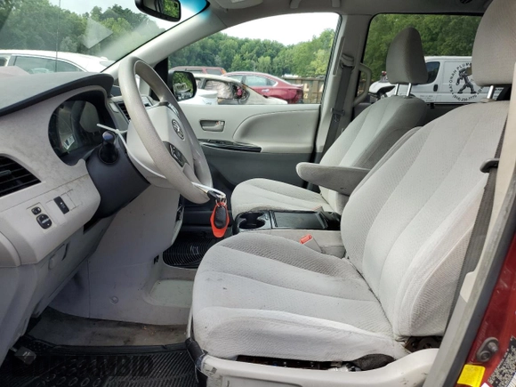 2012 Toyota Sienna LE AAS with VIN 5TDKK3DC4CS253719, listed as a Copart auction lot 63990175 with 155,561 mi miles and Salvage title. Bid and sale history available at DreamBid. Image 7.