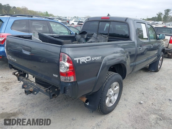 2015 Toyota Tacoma with VIN 3TMMU4FNXFM073978, listed as a IAAI auction lot 41935264 with 132,806 mi miles and . Bid and sale history available at DreamBid. Image 4.