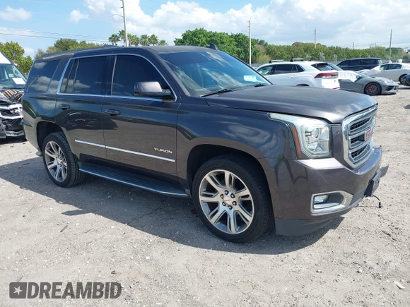 2016 GMC Yukon SLT with VIN 1GKS2BKC2GR277460, listed as a IAAI auction lot 42027026 with 111,191 mi miles. Bid and sale history available at carsss.com. Image 1.
