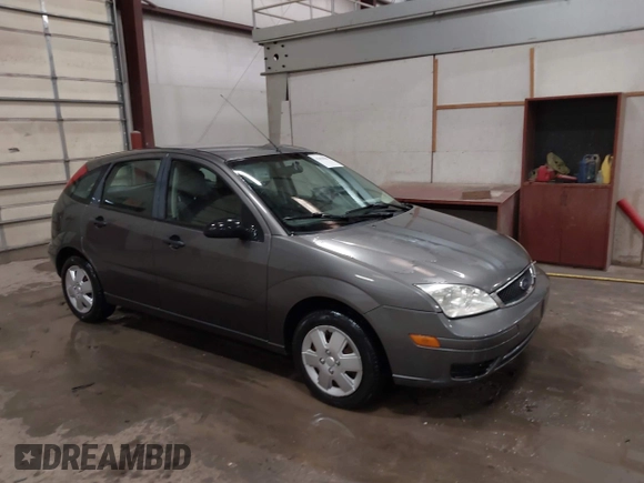 2007 Ford Focus S with VIN 1FAFP37N87W333049, listed as a IAAI auction lot 41450683 with 307,869 mi miles and . Bid and sale history available at carsss.com. Image 1.