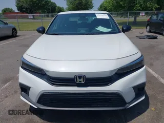 2024 Honda Civic Sport with VIN 2HGFE2F55RH563713, listed as a IAAI auction lot 42418239 with 9,687 mi miles and . Bid and sale history available at DreamBid. Image 12.