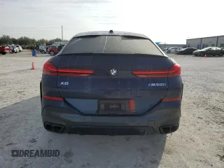 2025 BMW X6 M60i with VIN 5UX43EX01S9X19069, listed as a Copart auction lot 42613105 with 6,909 mi miles and Salvage Title. Bid and sale history available at carsss.com. Image 6.