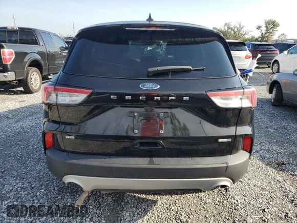 2020 Ford Escape SE z VIN 1FMCU9G60LUB71341, wystawiony jako Copart lot #64753865 z przebiegiem 138 490 mil mil oraz Czysty tytuł • Clean title. Historia ofert i sprzedaży dostępna na DreamBid. Obrazek 6.