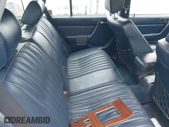 1987 Mercedes-Benz 300 with VIN WDBEB93D4HF025493, listed as a IAAI auction lot 41849239 with 343,514 mi miles and . Bid and sale history available at DreamBid. Image 8.