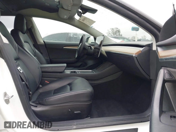 2023 Tesla Model 3 with VIN 5YJ3E1EA3PF401446, listed as a IAAI auction lot 41565881 with Not Provided miles and . Bid and sale history available at carsss.com. Image 5.