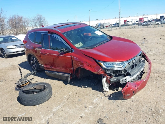 2019 Honda CR-V Touring with VIN 2HKRW1H9XKH500025, listed as a IAAI auction lot 41667564 with 73,889 mi miles. Bid and sale history available at carsss.com. Image 1.