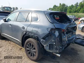 2024 Mazda CX-50 S Premium z VIN 7MMVABDM7RN231991, wystawiony jako IAAI lot #42481427 z przebiegiem 7 843 mil mil oraz . Historia ofert i sprzedaży dostępna na DreamBid. Obrazek 21.