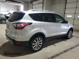 2017 Ford Escape Titanium with VIN 1FMCU9JD9HUC58945, listed as a Copart auction lot 52341485 with 31,074 mi miles and Salvage Title. Bid and sale history available at carsss.com. Image 3.