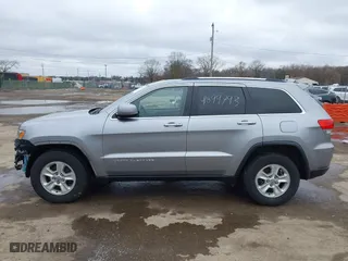 2015 Jeep Grand Cherokee Altitude with VIN 1C4RJFAG0FC657942, listed as a IAAI auction lot 41899793 with 102,277 mi miles. Bid and sale history available at carsss.com. Image 15.