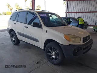 2001 Toyota RAV4 with VIN JTEGH20V410002488, listed as a IAAI auction lot 42171100 with 313,583 mi miles and . Bid and sale history available at DreamBid. Image 1.