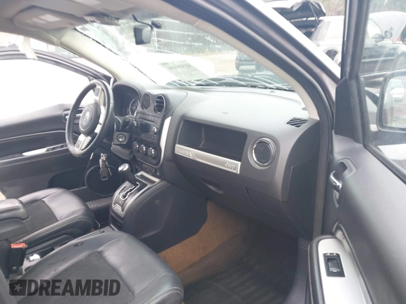 2016 Jeep Compass Latitude with VIN 1C4NJDEB4GD687300, listed as a IAAI auction lot 41800186 with 169,374 mi miles. Bid and sale history available at carsss.com. Image 5.