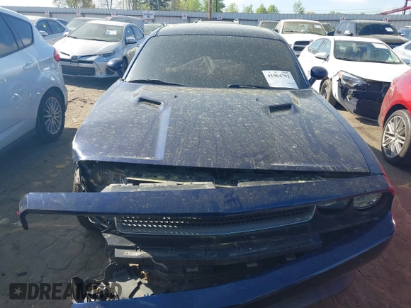 2013 Dodge Challenger SXT z VIN 2C3CDYAG2DH587643, wystawiony jako IAAI lot #41964792 z przebiegiem 179 791 mil mil oraz . Historia ofert i sprzedaży dostępna na DreamBid. Obrazek 12.