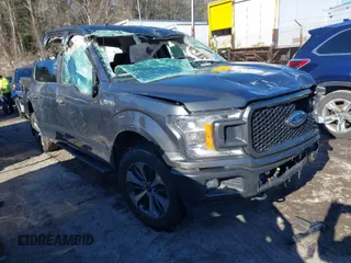 2019 Ford F-150 XL with VIN 1FTEW1EP9KFC73664, listed as a IAAI auction lot 41614891 with 100,320 mi miles. Bid and sale history available at carsss.com. Image 1.