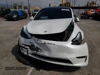 2022 Tesla Model Y Performance with VIN 7SAYGDEF6NF493231, listed as a Copart auction lot 52336284 with 37,116 mi miles and Salvage title. Bid and sale history available at DreamBid. Image 10.