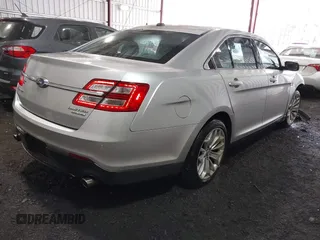 2014 Ford Taurus Limited with VIN 1FAHP2F81EG101351, listed as a IAAI auction lot 41662308 with 139,542 mi miles. Bid and sale history available at carsss.com. Image 4.