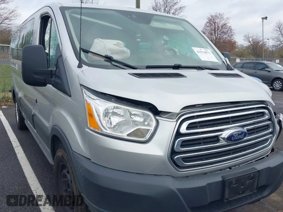 2018 Ford Transit Passenger XL z VIN 1FBZX2ZM2JKB02141, wystawiony jako IAAI lot #41914073 z przebiegiem 103 718 mil mil oraz . Historia ofert i sprzedaży dostępna na DreamBid. Obrazek 1.
