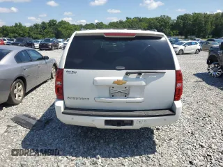 2013 Chevrolet Suburban LT with VIN 1GNSCJE0XDR146798, listed as a Copart auction lot 62408525 with 218,484 mi miles and Salvage title. Bid and sale history available at DreamBid. Image 6.