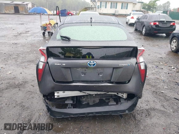 2016 Toyota Prius Two z VIN JTDKBRFU7G3000989, wystawiony jako IAAI lot #42345088 z przebiegiem 117 427 mil mil oraz . Historia ofert i sprzedaży dostępna na DreamBid. Obrazek 16.