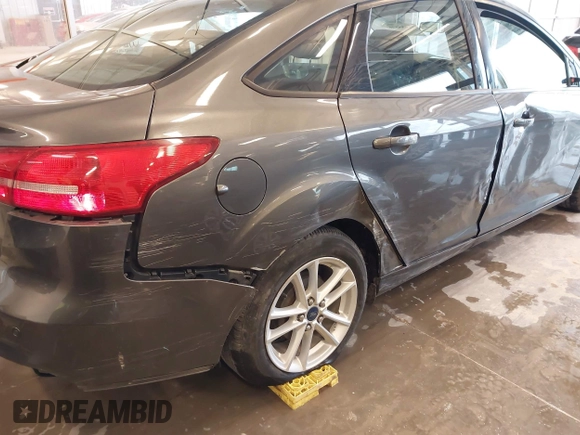 2016 Ford Focus SE with VIN 1FADP3F20GL234077, listed as a IAAI auction lot 41933546 with 106,184 mi miles and . Bid and sale history available at DreamBid. Image 6.